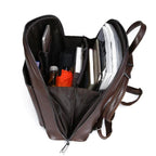 Mochila de cuero marrón oscuro abierta, con bolsillo interior y compartimento