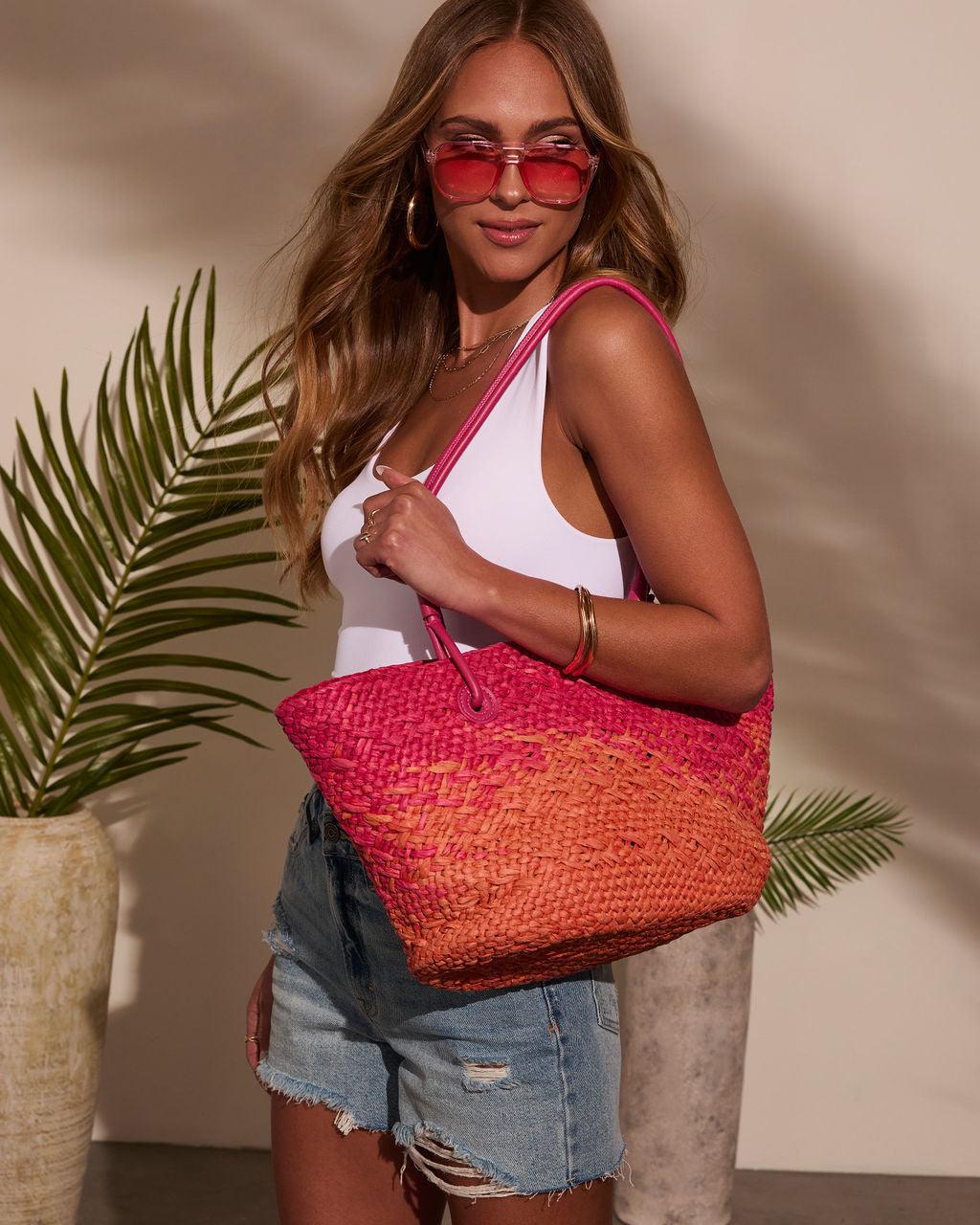 Bolso tote de rafia rosa y naranja, asas fucsia y tejido en espiga