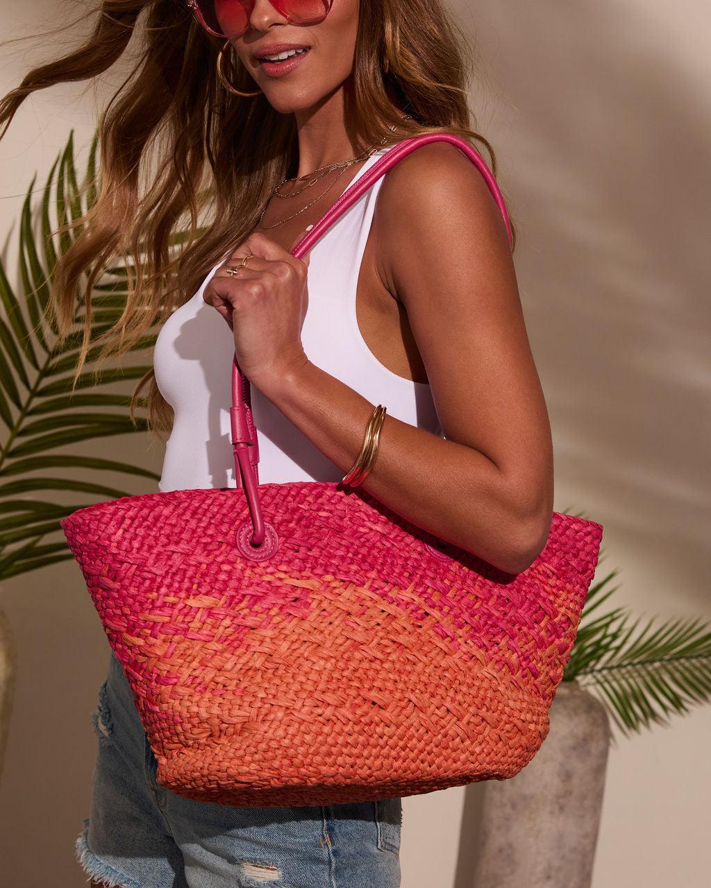 Bolso tote de rafia trenzada rosa y naranja con asas fucsia