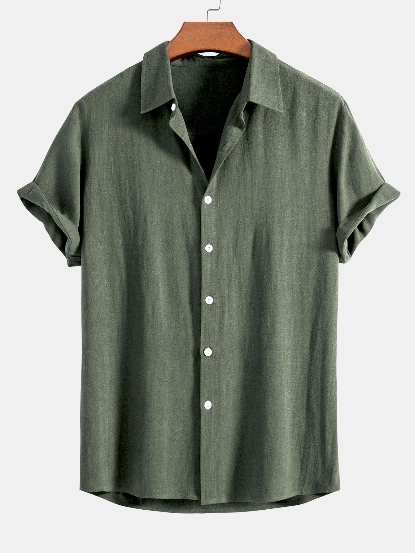 Camisa abotonada de lino y rayón color verde oscuro con botones blancos
