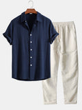 Conjunto camisa abotonada azul marino y pantalón recto de lino con cordón, manga corta
