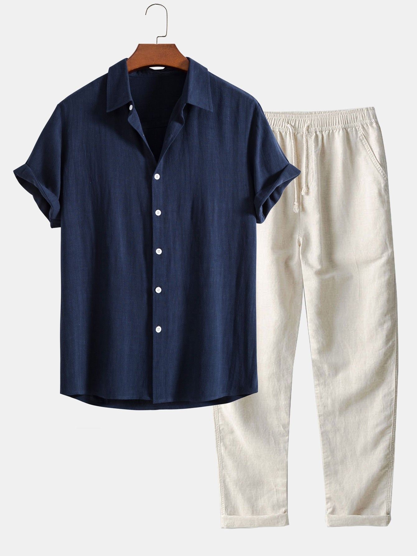Conjunto camisa abotonada azul marino y pantalón recto de lino con cordón, manga corta