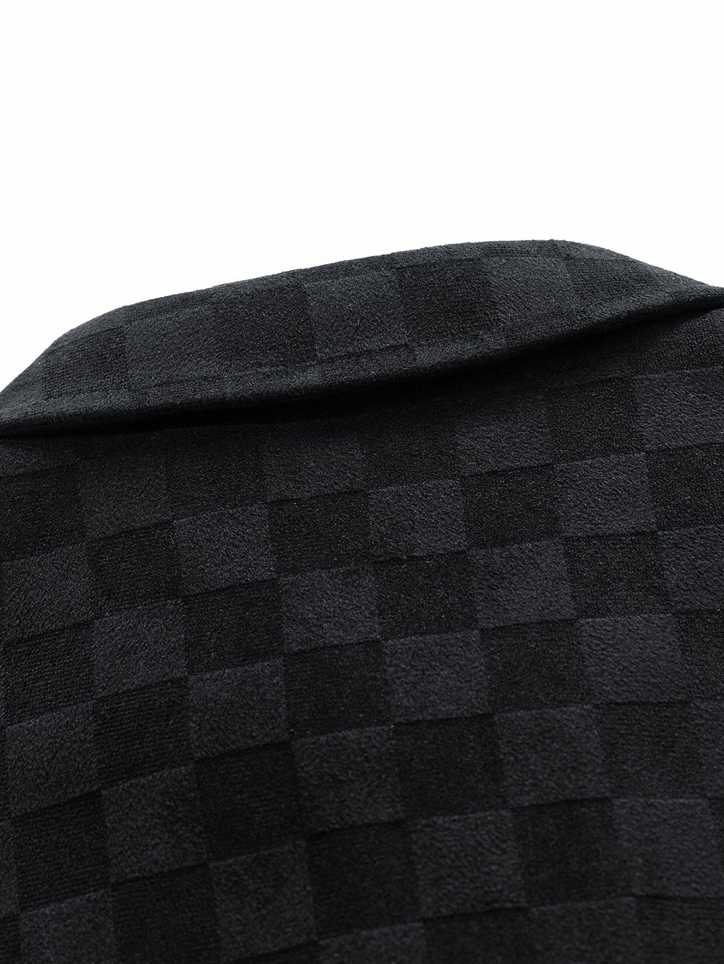 Tejido de ante negro con estampado cuadros en relieve y textura