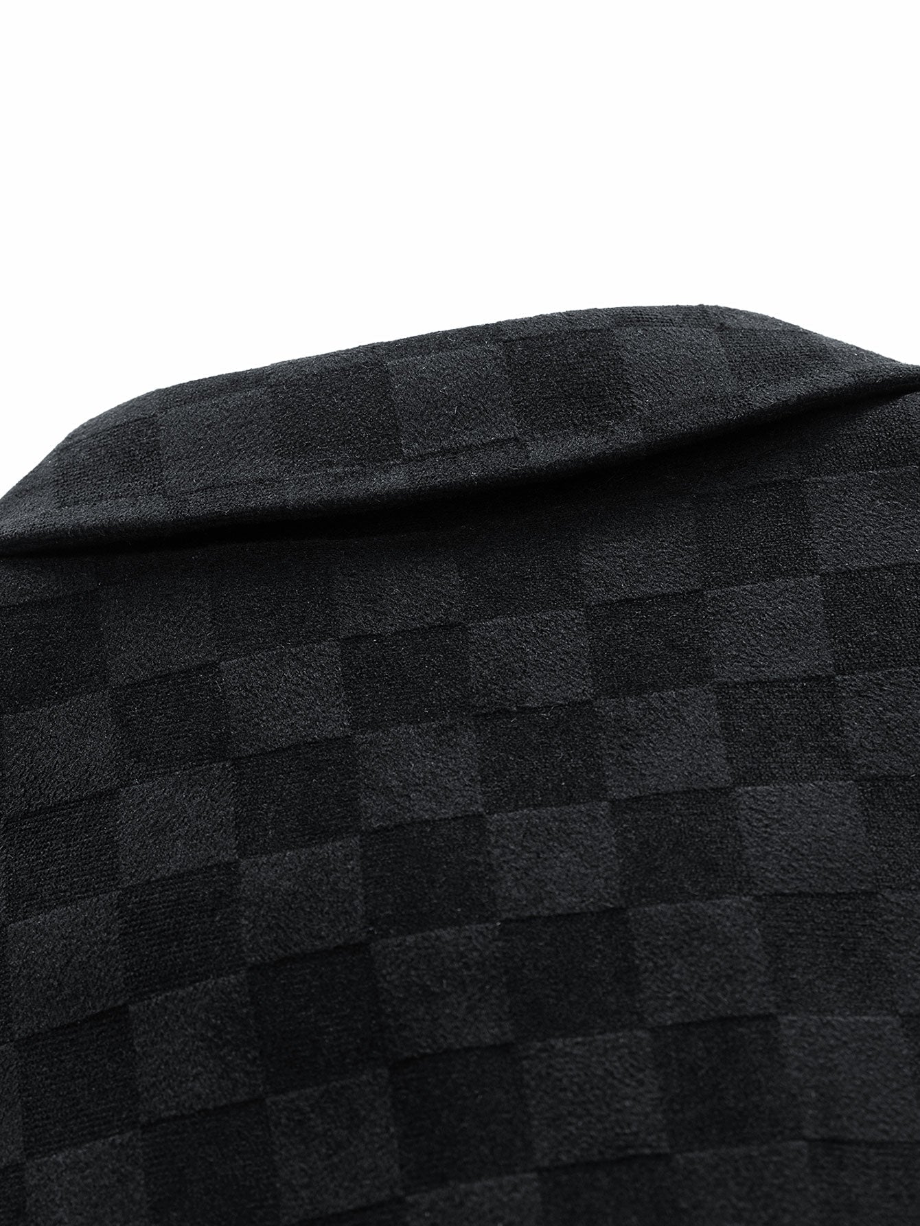 Tejido de ante negro con estampado cuadros en relieve y textura