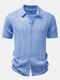 Camisa Marbella azul de punto con botones y cuello tipo polo, calada