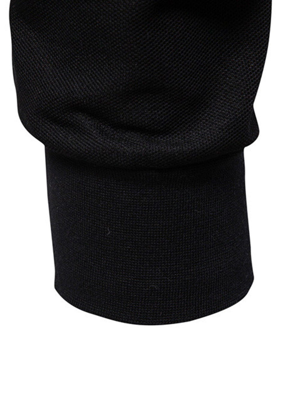 Polo negro de manga larga con puño y dobladillo acanalados.