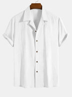 Camisa de algodón texturizado blanca con botones y mangas cortas
