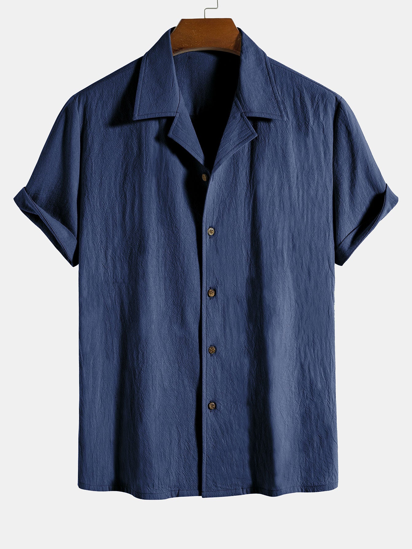 Camisa de algodón texturizado azul marino con botones y mangas cortas