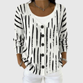 Chaqueta de punto blanca con rayas negras, botones delanteros y cuello en V, manga larga