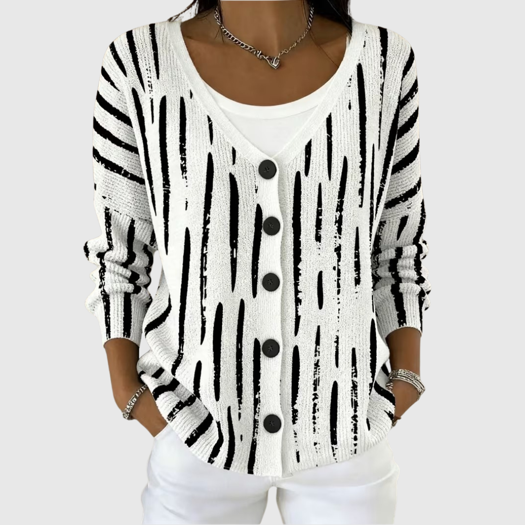 Chaqueta de punto blanca con rayas negras, botones delanteros y cuello en V, manga larga