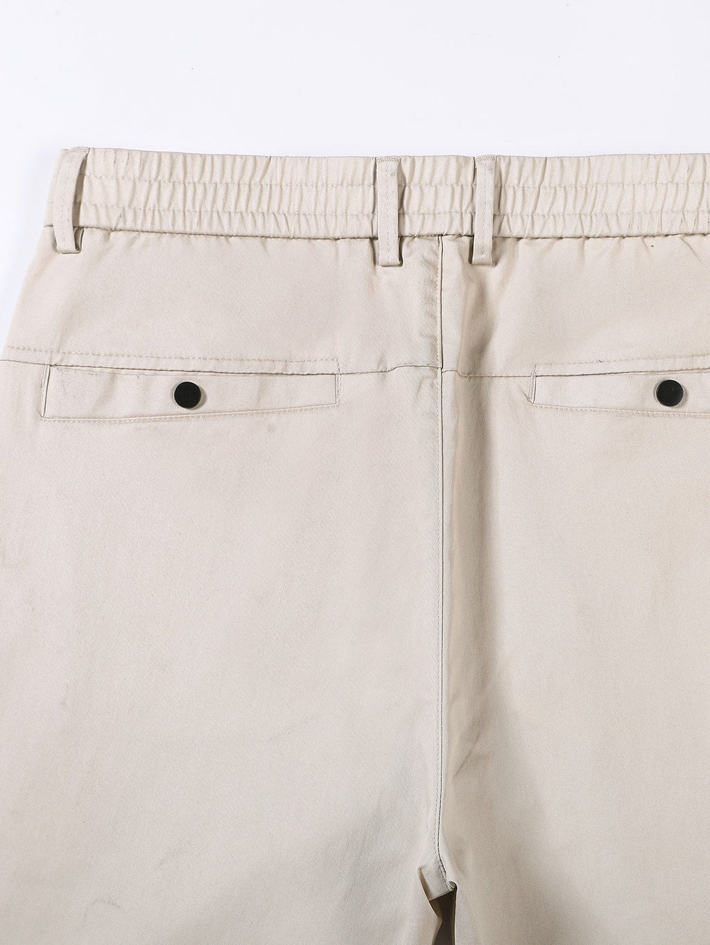 Pantalón recto beige con cinturilla elástica y dos bolsillos traseros