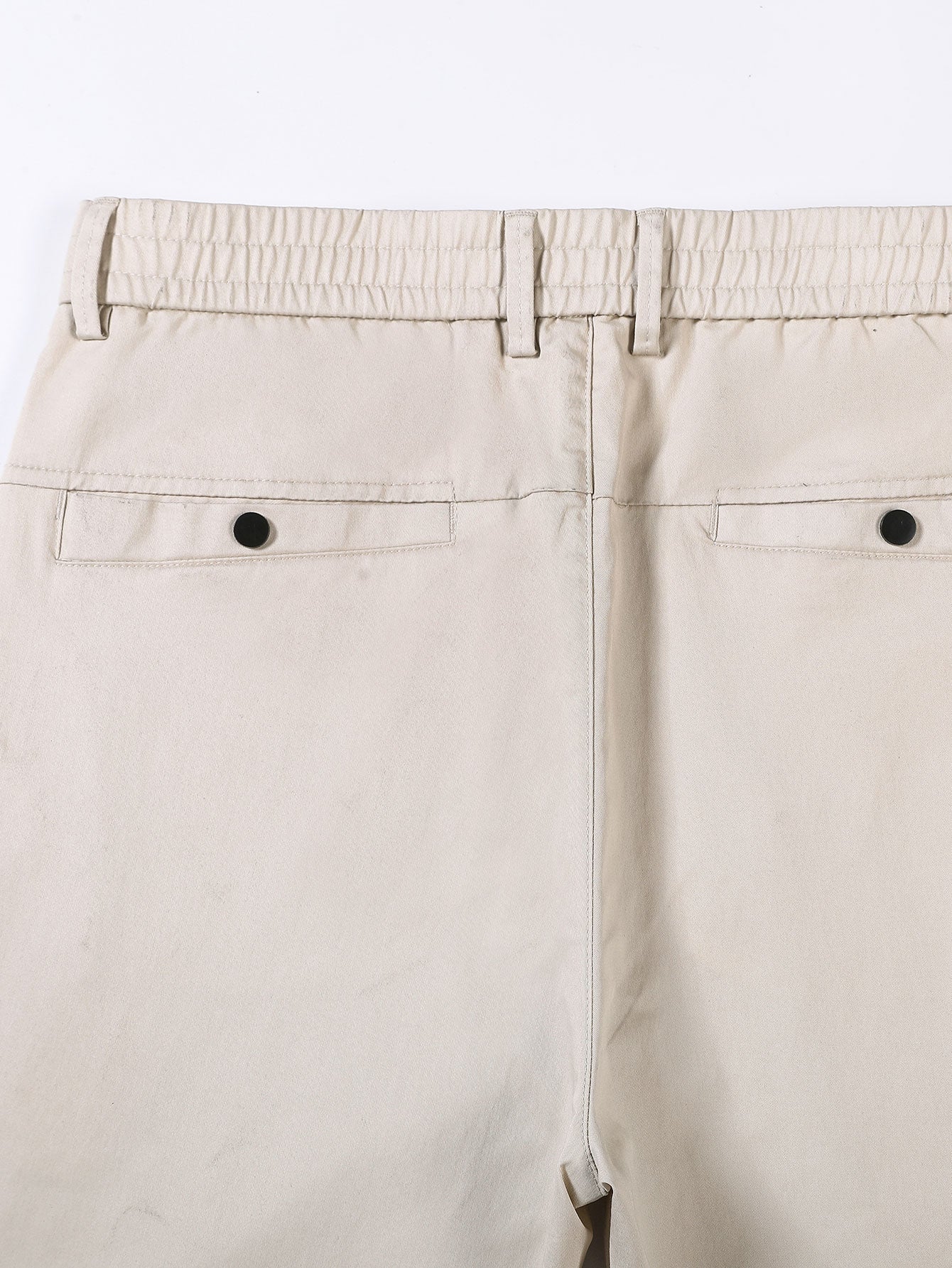 Pantalón recto beige con cinturilla elástica y dos bolsillos traseros
