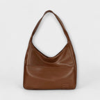 Bolso maxi de hombro marrón con asa superior y bolsillo frontal
