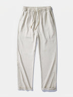 Pantalón recto de lino a rayas beige, cintura elástica y cordón ajustable