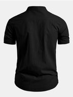 Camisa Capri negra de manga corta, vista trasera con cuello alzado