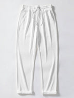 Pantalones rectos blancos acanalados con cintura elástica y cordón ajustable
