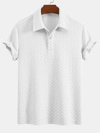 Polo de jacquard geométrico blanco, cuello con botones y manga corta