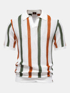 Polo de punto Firenze rayas verticales blancas, verdes y naranjas, cuello tipo V.