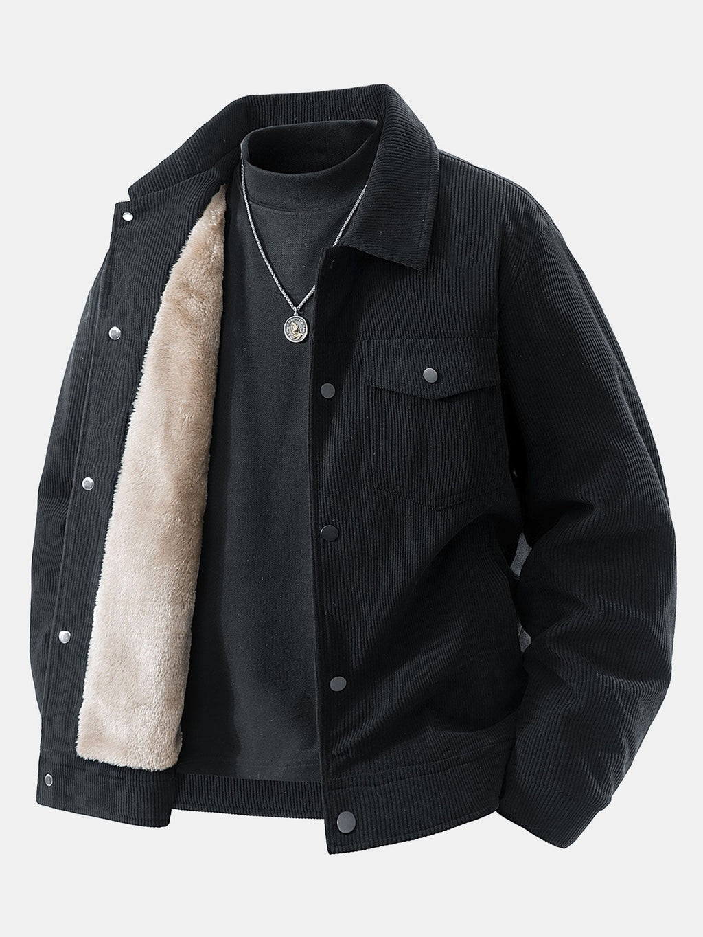 Chaqueta de pana negra con forro teddy claro interior y bolsillos con solapa.