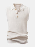 Polo sin mangas crema de punto con cuello camisero y botones delanteros