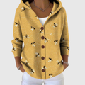 Chaqueta de punto con capucha mostaza, botones frontales y estampado de abejas