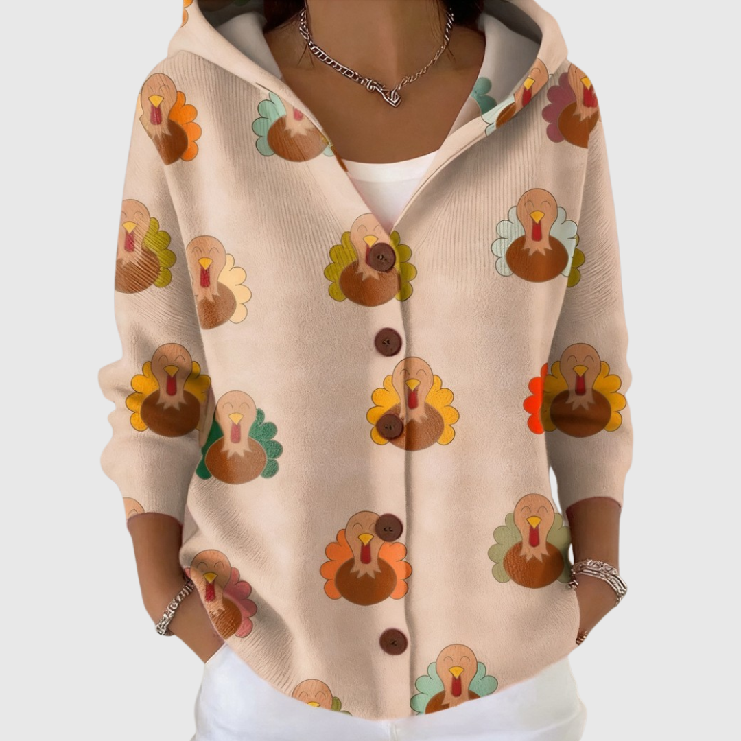 Chaqueta de punto con capucha beige y estampado de pavos, botones marrones al frente