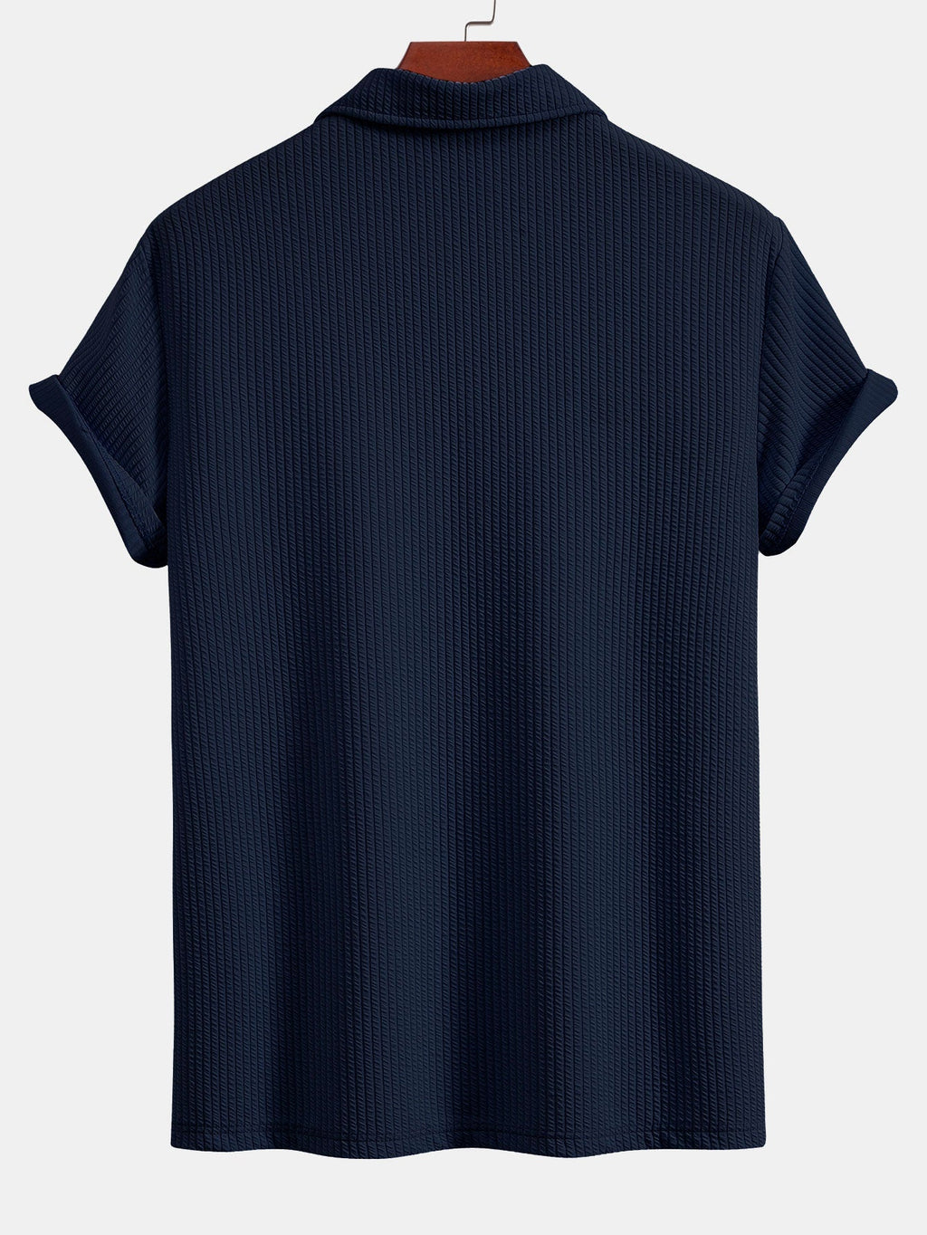 Polo Monaco azul marino de manga corta con cuello y parte trasera lisa.