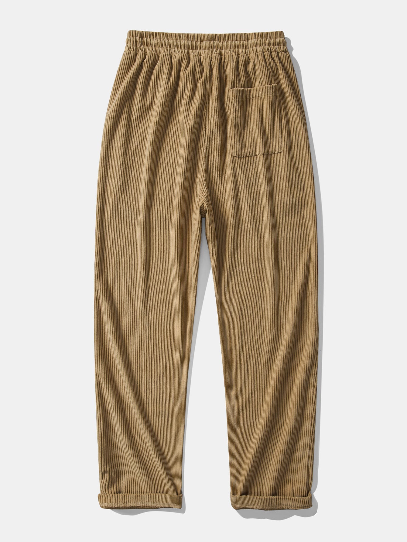 Pantalón recto de pana camel, cintura elástica con cordón y bolsillo en el muslo.