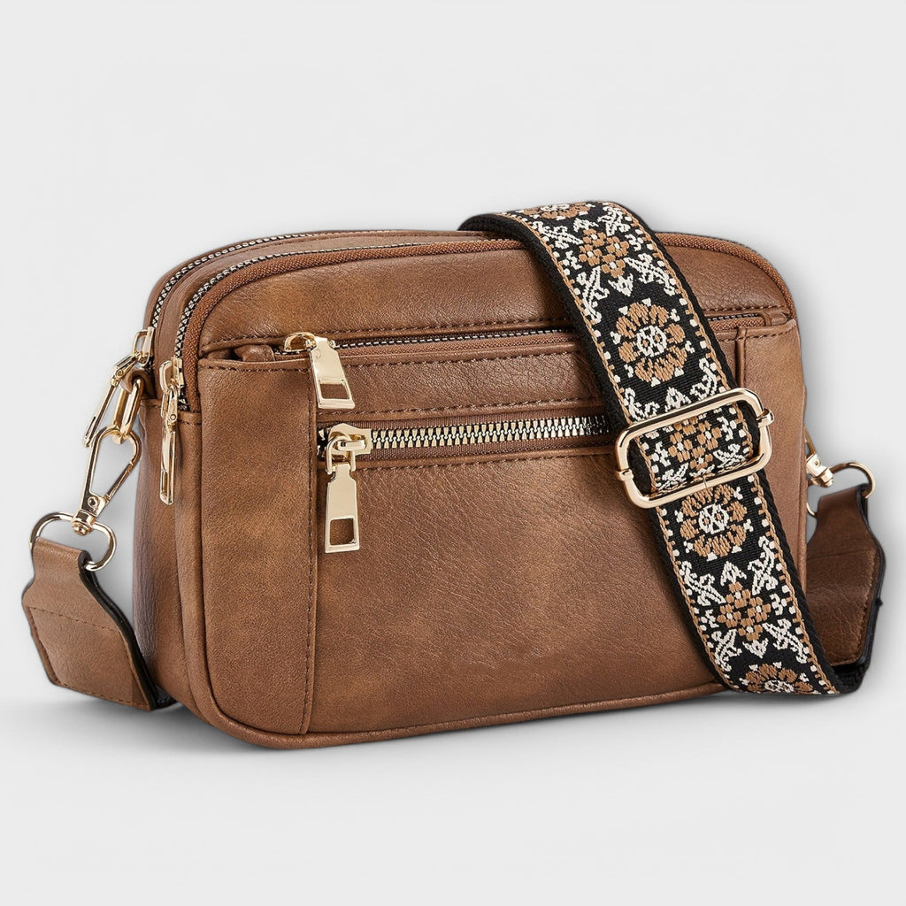 Bolso bandolera retro marrón con asa bandolera y correa estampada floral negra