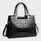 Bolso de piel efecto cocodrilo negro con asas superiores y bandolera