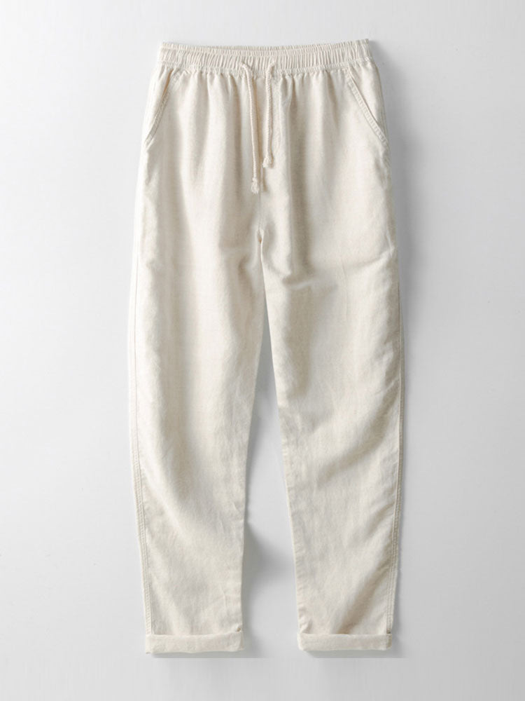Pantalón recto de lino color crema con pretina elástica y cordón