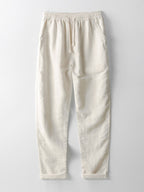 Pantalón recto de lino color crema con pretina elástica y cordón