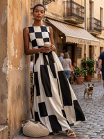 Vestido maxi sin mangas blanco y negro con cuadros grandes, cinturilla y falda con vuelo