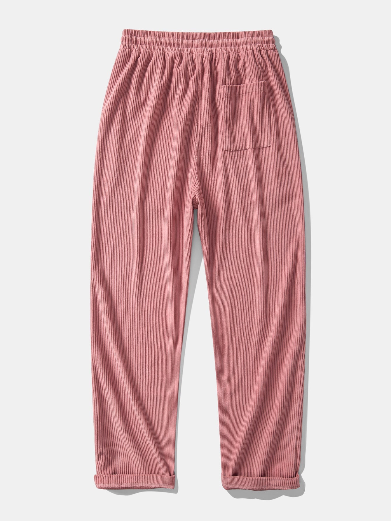 Pantalón recto de pana rosa, cintura elástica con cordón y bolsillo en la pierna.