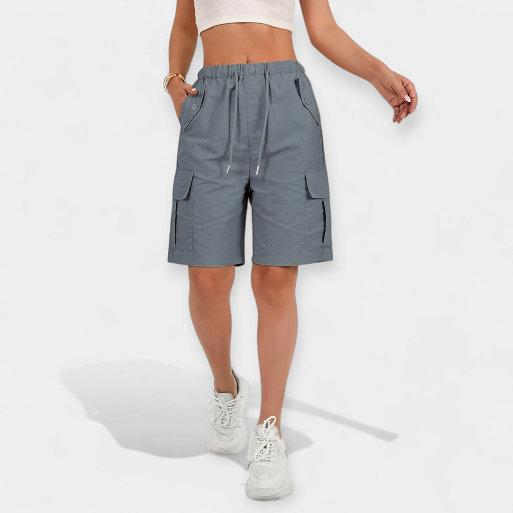 Shorts cargo de verano azul grisáceo, cintura elástica con cordón y bolsillos laterales con solapa