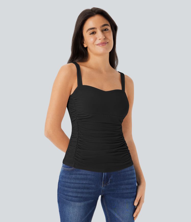 Top negro sin mangas con tirantes finos y fruncido lateral