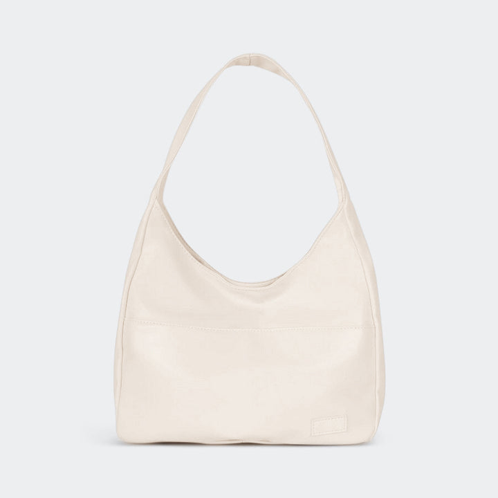 Bolso maxi de hombro marfil con asa superior y bolsillo frontal