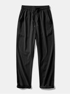 Pantalón recto negro con cintura elástica y cordón ajustable