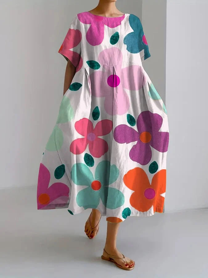 Vestido fluido Eli midi estampado floral multicolor, tonos fucsia y naranja, mangas cortas