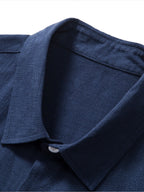 Camisa Riviera azul marino con cuello camisero y botones