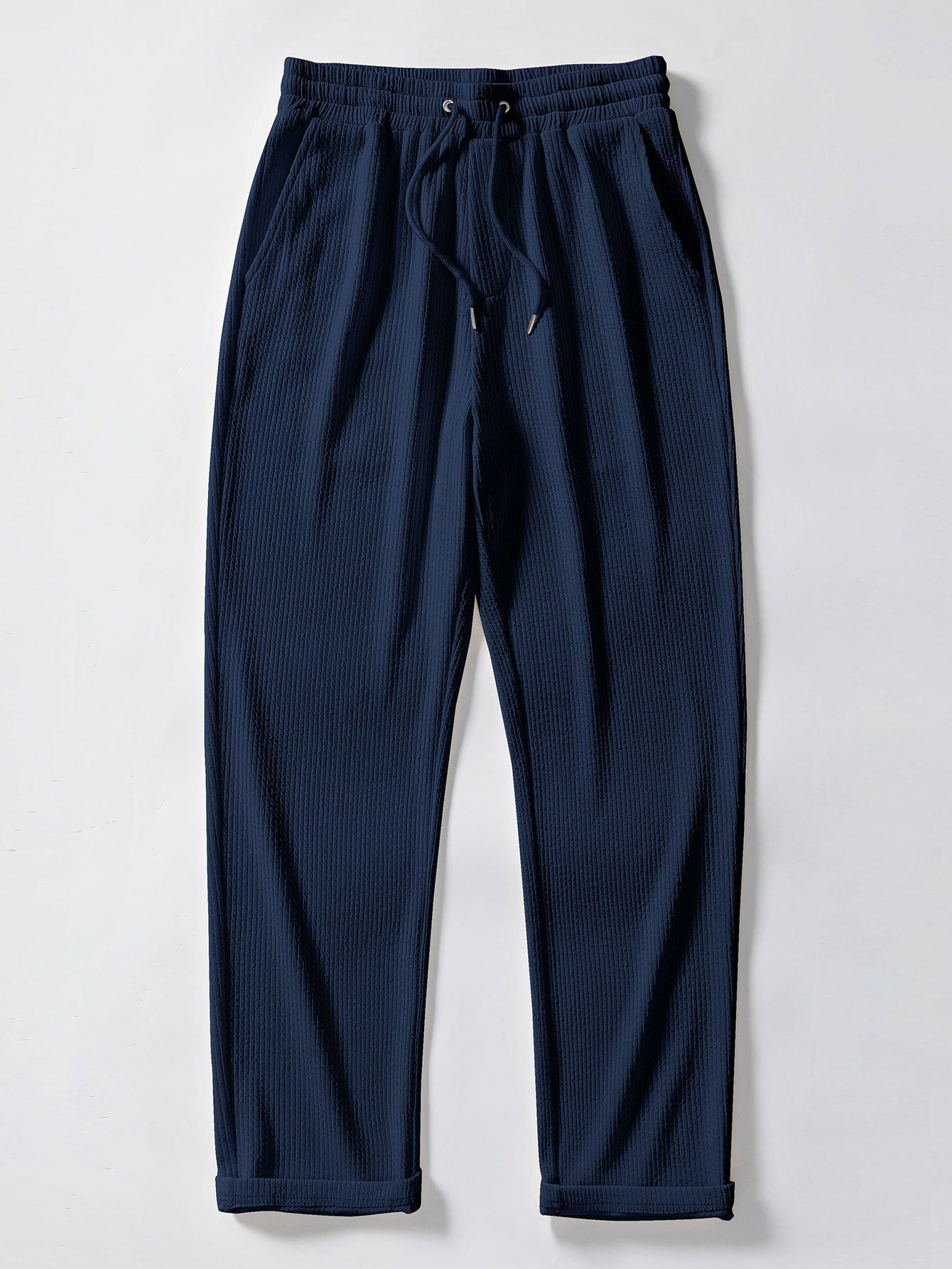 Pantalón recto acanalado azul marino con cinturilla elástica y cordón