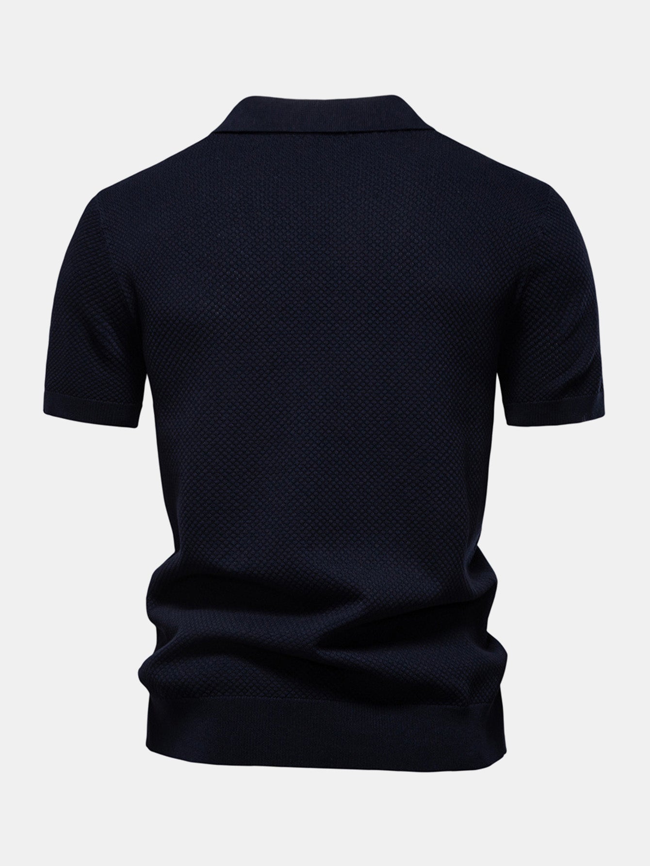 Polo azul marino de manga corta, vista trasera con cuello camisero y bajo fruncido.