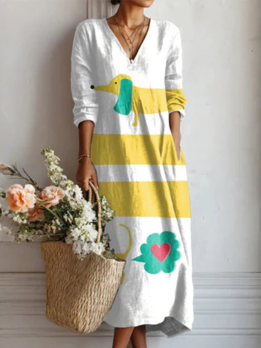 Vestido largo bohemio blanco con franjas amarillas y estampado verde con corazones
