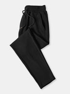 Pantalones rectos negros de tejido acanalado con cintura elástica y cordón