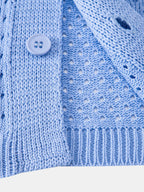 Camisa Marbella azul de punto calado con botón y bajo acanalado
