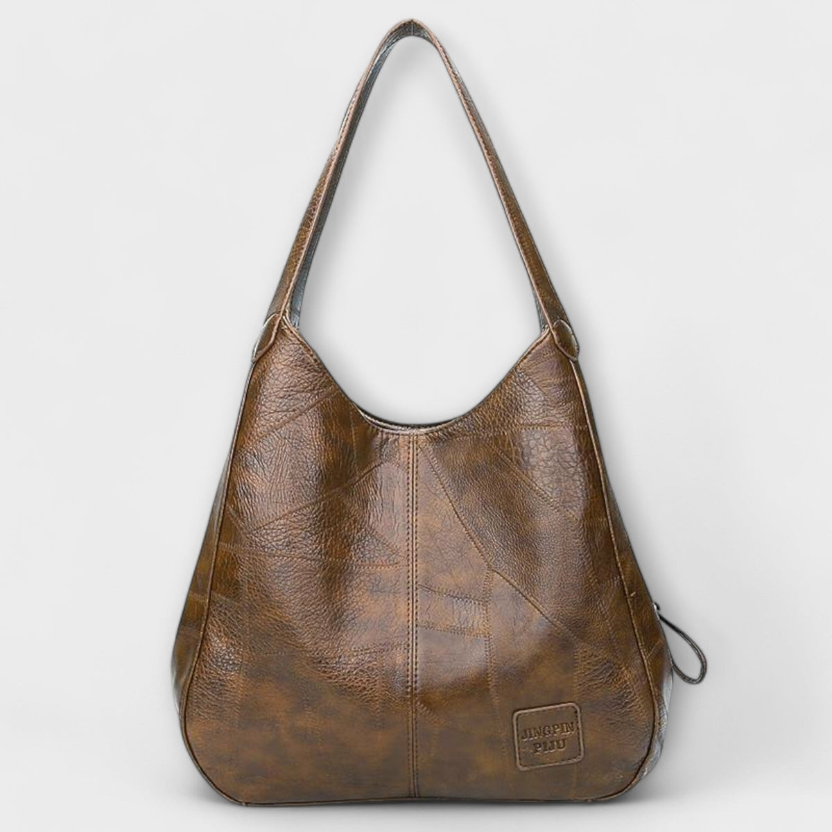 Bolso hobo de piel marrón con asas largas y bolsillo frontal con placa