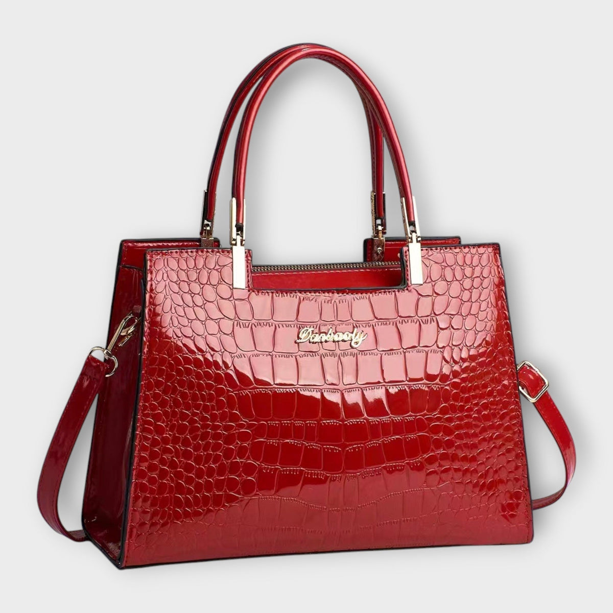 Bolso de piel efecto cocodrilo rojo con asas superiores y bandolera