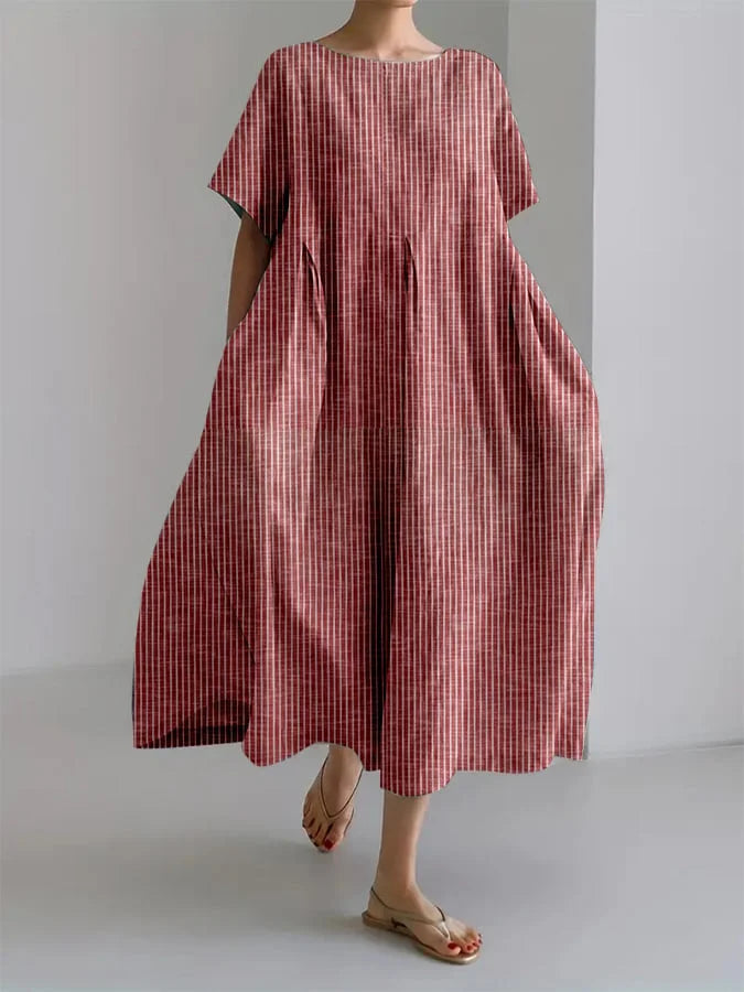 Vestido midi suelto rojo de manga corta y cuello redondo, con bolsillos laterales