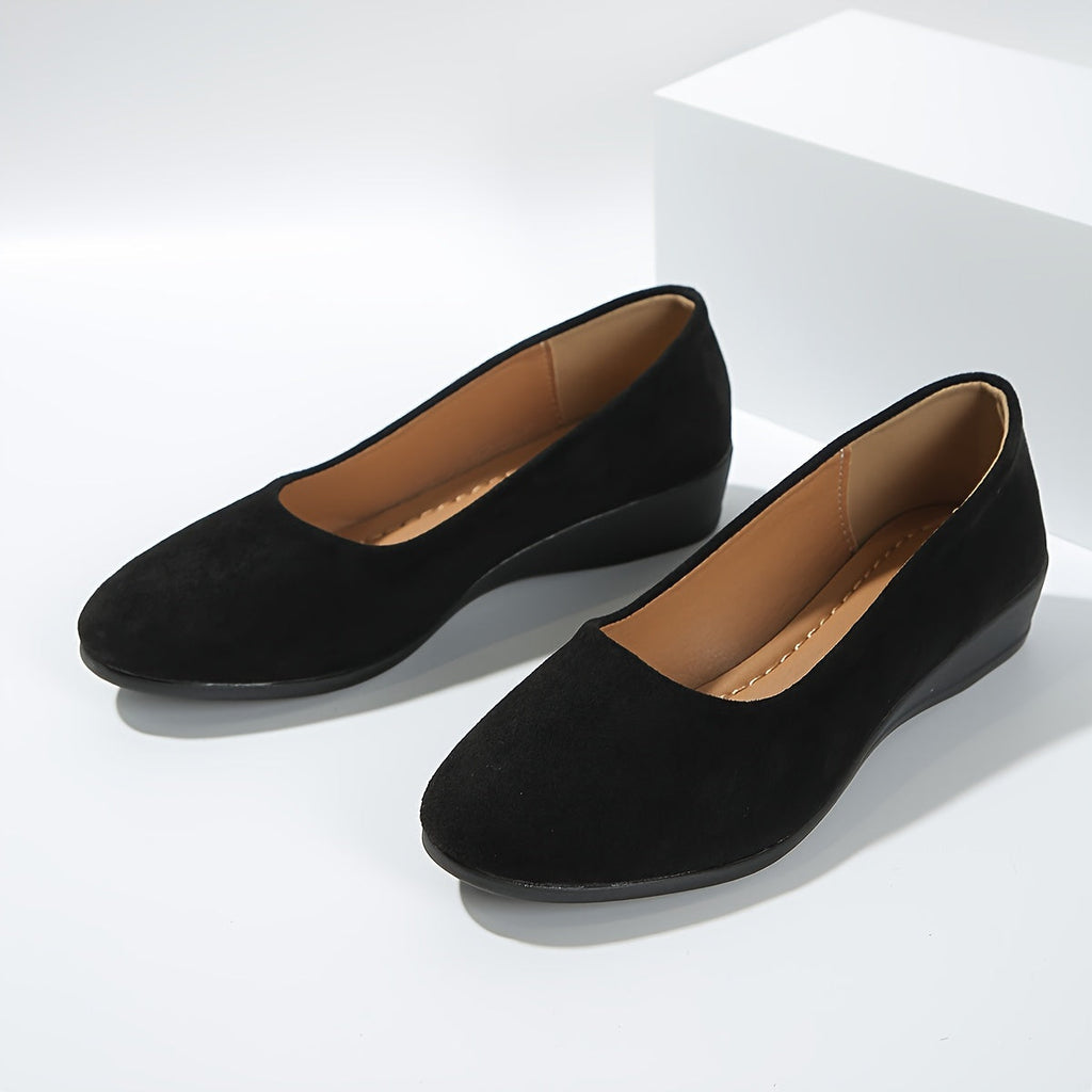 Par de bailarinas Éliane de ante negro con suela cuña y plantilla color beige
