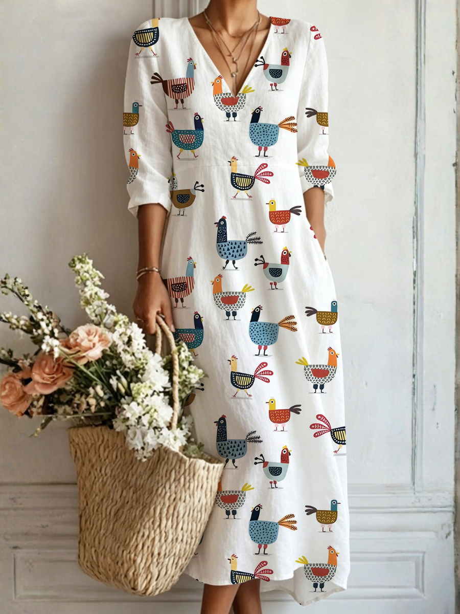 Vestido largo bohemio blanco con estampado multicolor de animales y manga tres cuartos